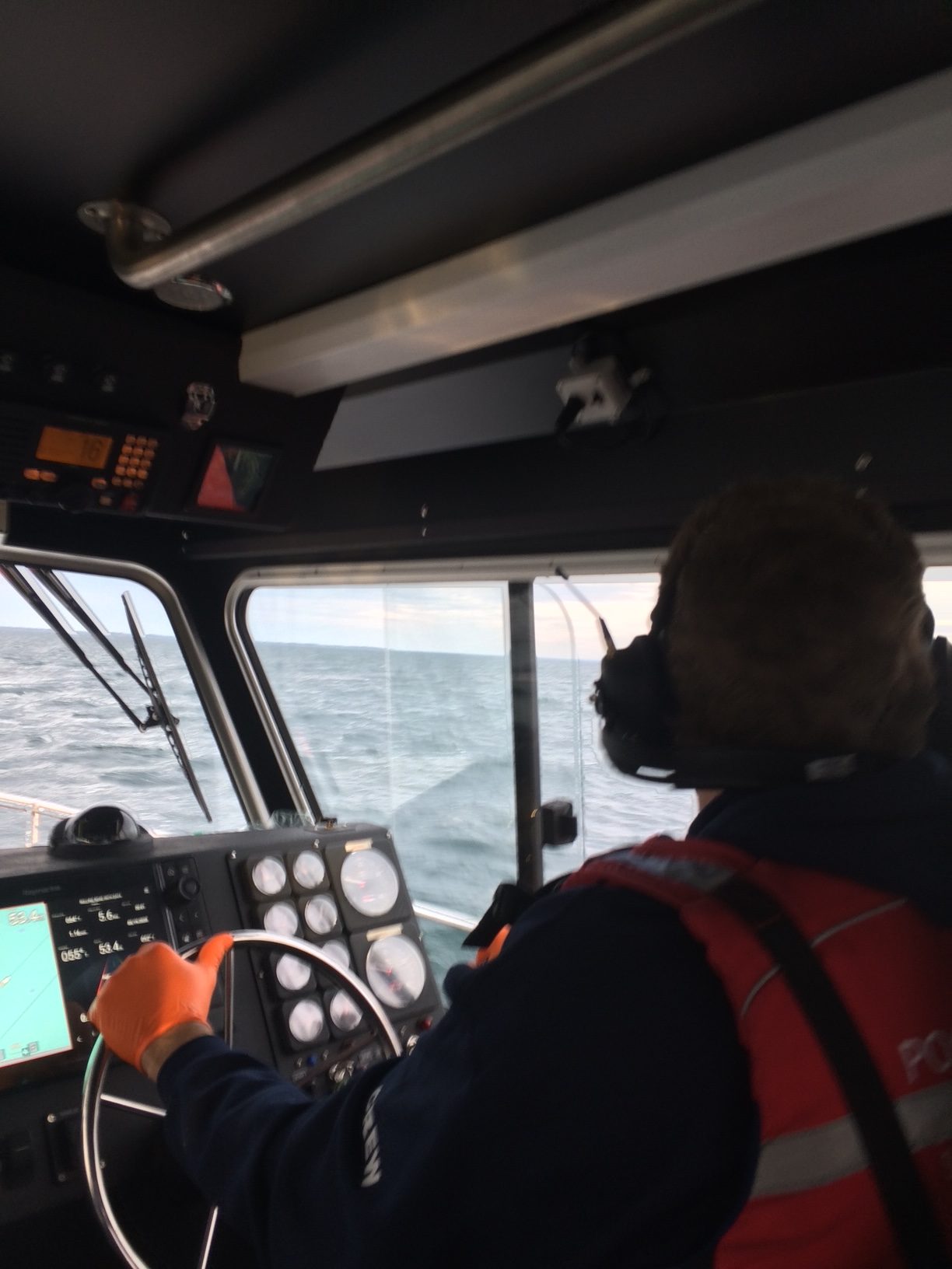 Helmsman preparing approach to disabled vessel